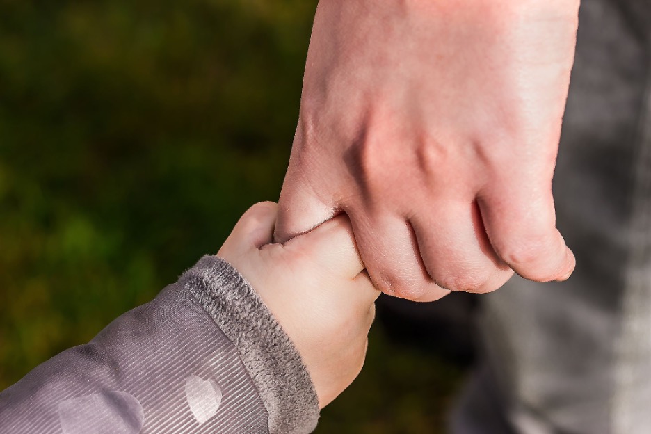 baby holding hand