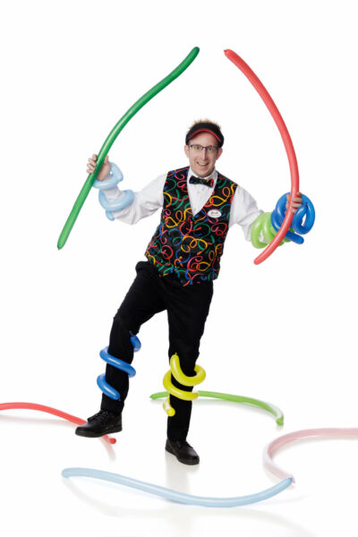 Jonah is holding balloons